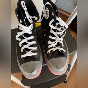 Black and Orange All Stars with clear rubber.